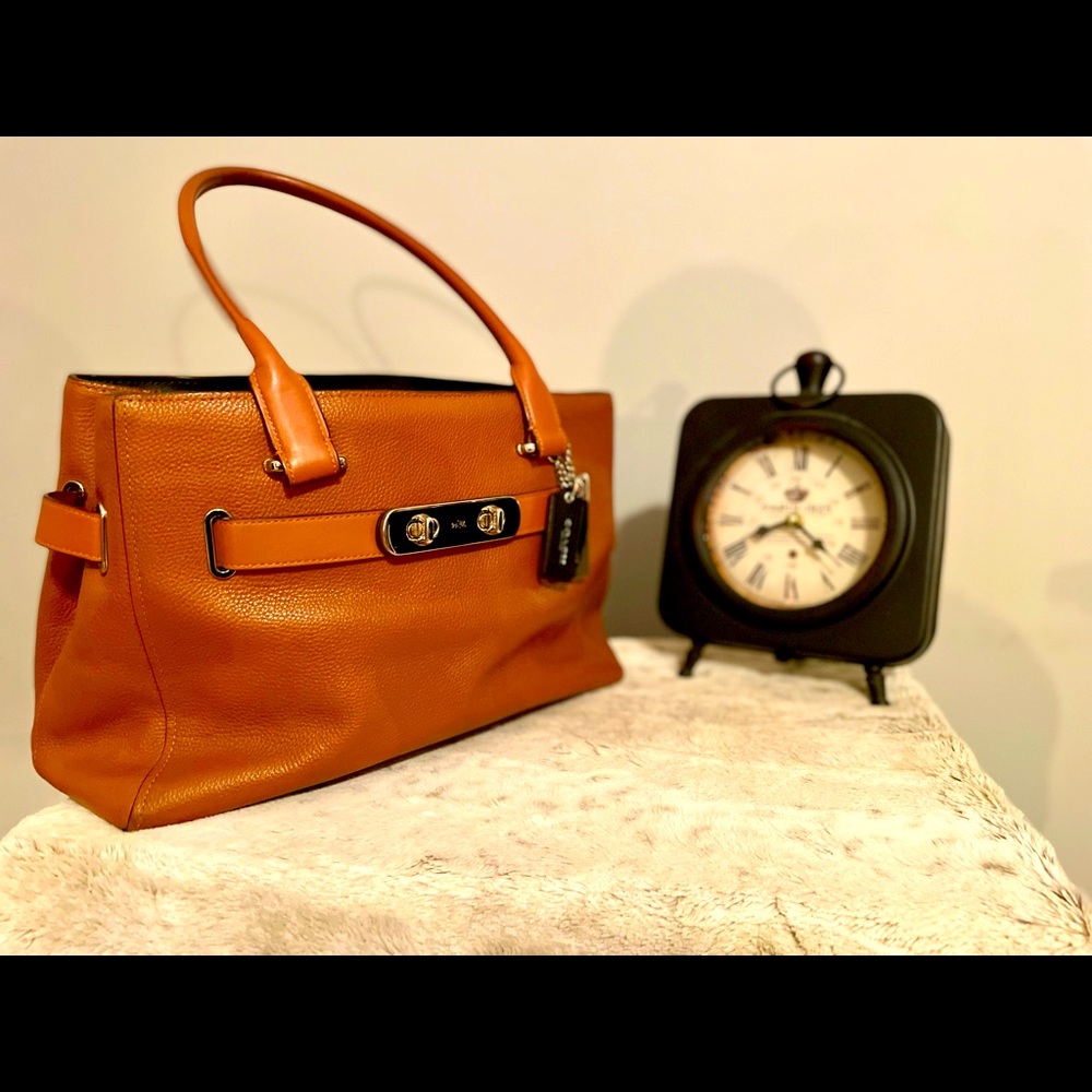 Structured brown leather Coach handbag